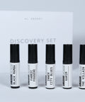 Al Ansary Perfume Discovery Set with sample vials in a white and black presentation box.