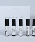 Al Ansary Women’s Perfume Discovery Set with perfume sample vials in an elegant white and black box
